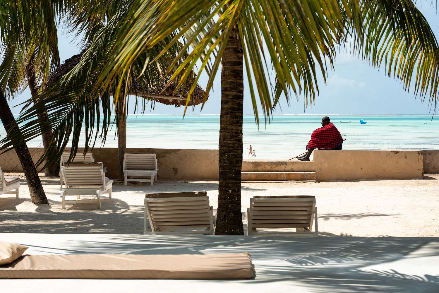Zanzibar beach with turquoise ocean and palm trees